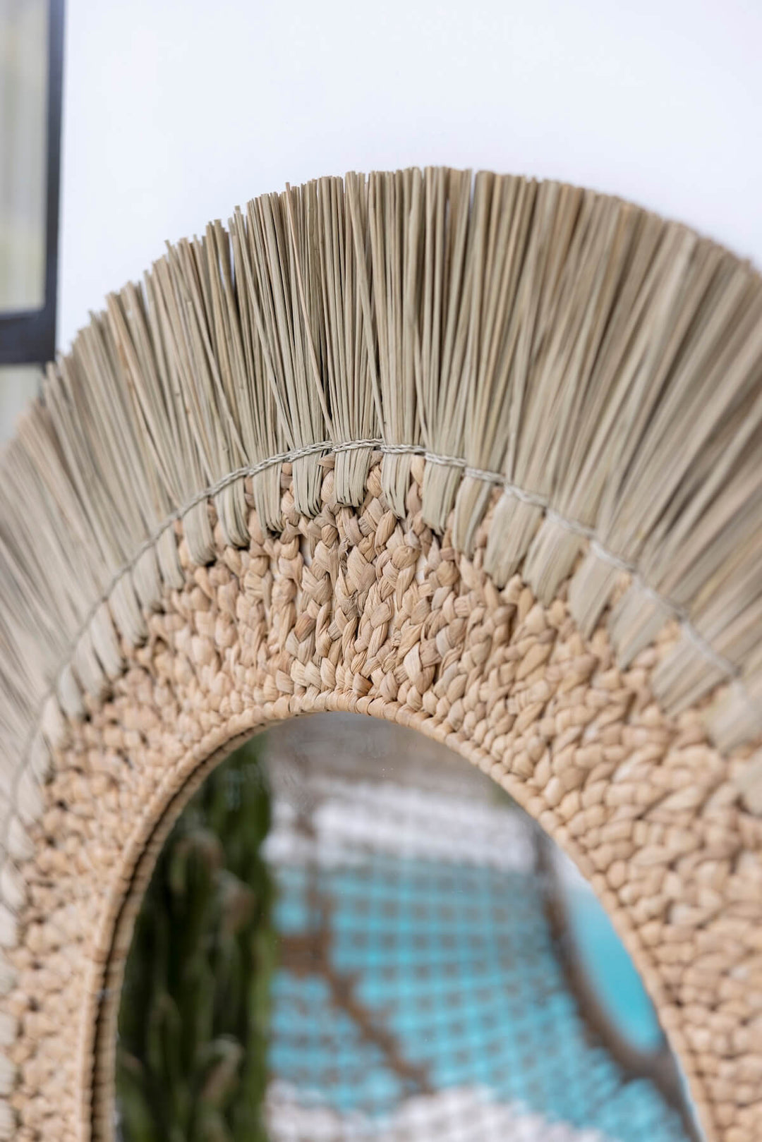 Detailaufnahme des Seegrasrahmens des Sennai Spiegels von Evasi